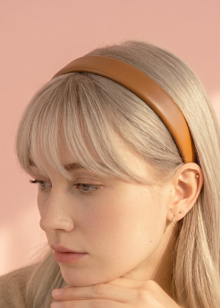 Blonde Collarbone Hair With Blunt Bangs And Faux Leather Blonde Collarbone Hair With Blunt Bangs And Faux Leather — Padded Headband Hairstyles 2027