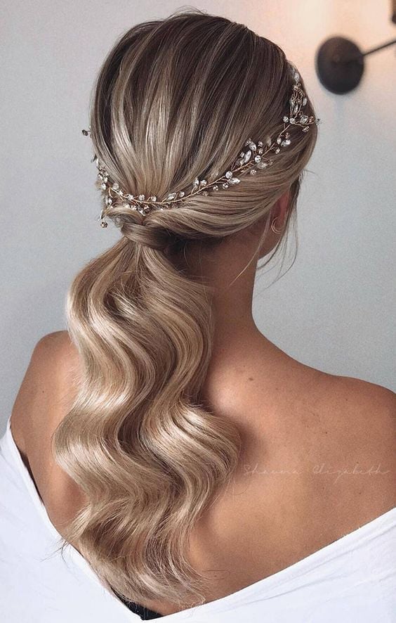 Low Side-Swept Ponytail With Accessory — Ponytail Bridal Shower Hairstyles 2027
