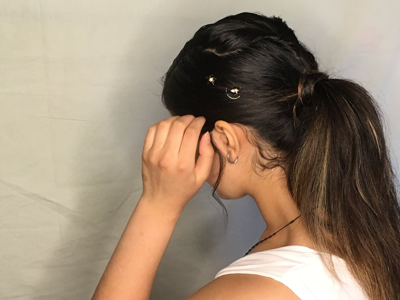 Dark Brown Ponytail With Blonde Highlights And Pins Dark Brown Ponytail With Blonde Highlights And Pins — Ponytail Disney Hairstyles 2027