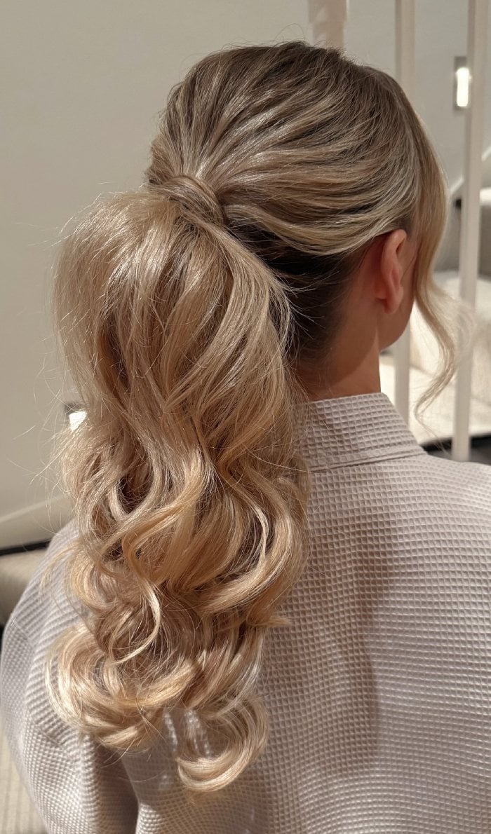 Voluminous Blonde Curls Low Ponytail Voluminous Blonde Curls Low Ponytail — Ponytail Festival Hairstyles 2027