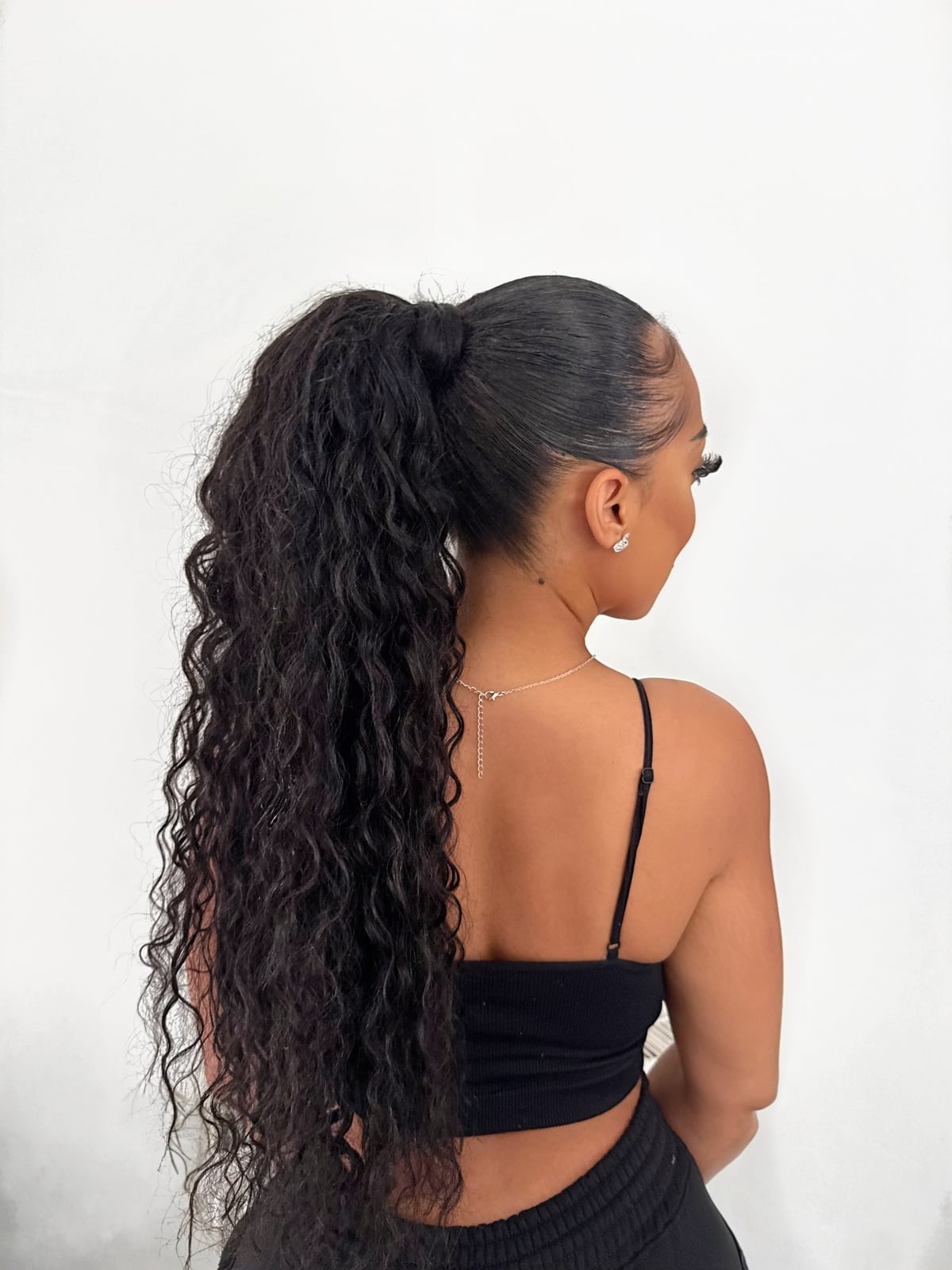 Black Curly Ponytail With Sleek Front Black Curly Ponytail With Sleek Front — Ponytail Hairstyles 2027 for Curly Hair