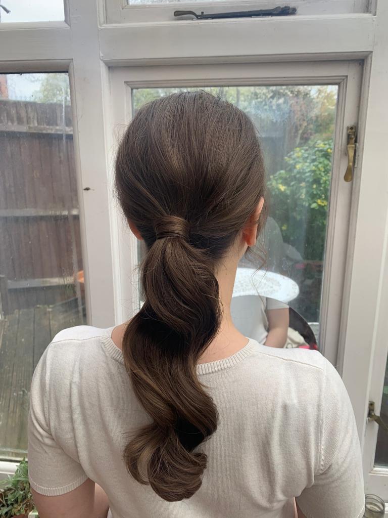 Polished Low Ponytail With Defined Waves Polished Low Ponytail With Defined Waves — Ponytail Hairstyles 2027 for Women Over 40