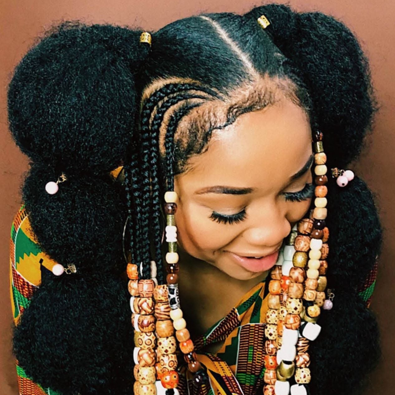 Black Coily Ponytails With Braids and Beads Black Coily Ponytails With Braids and Beads — Puff Ponytail 2027