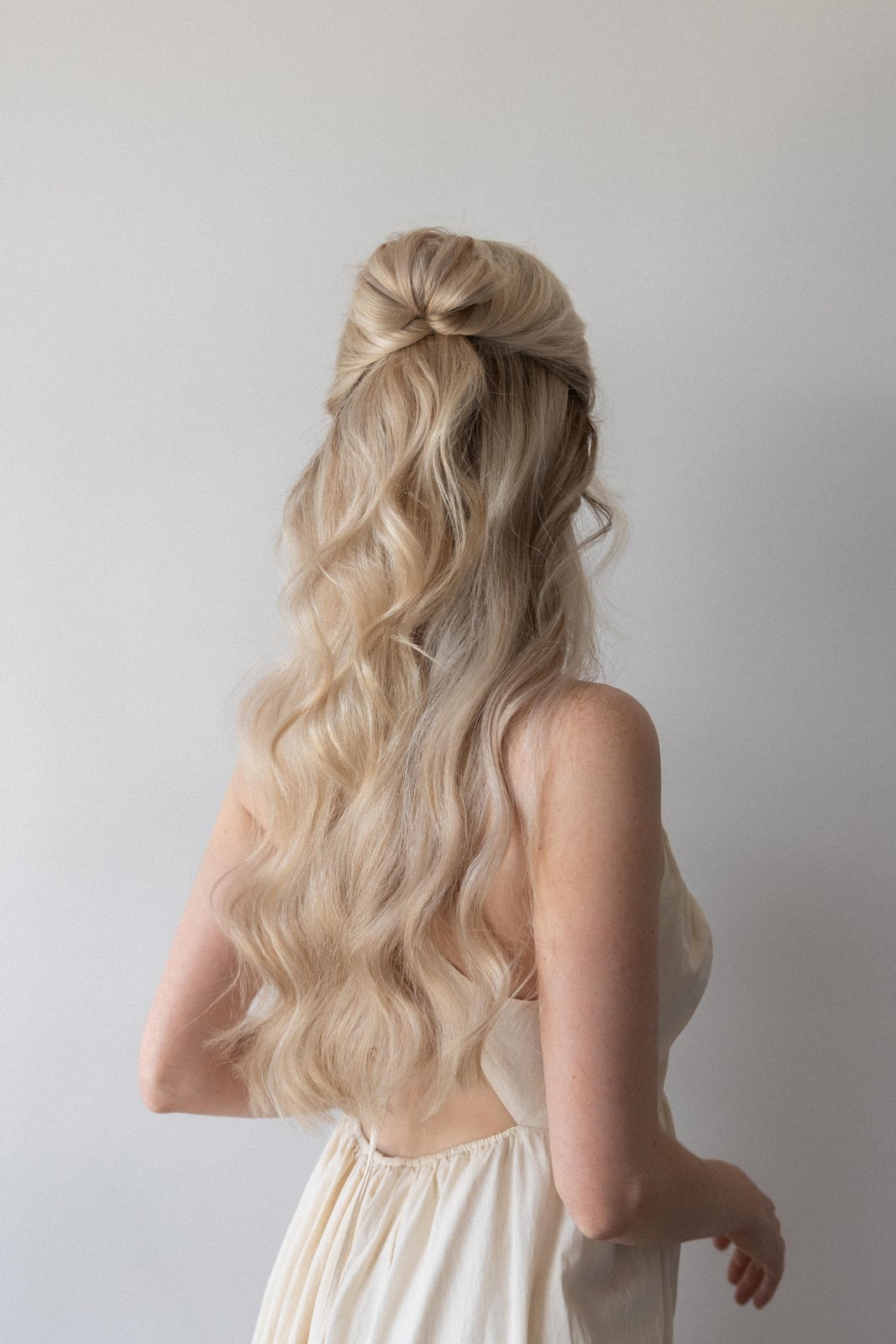 Ash Blonde Half-Up Twisted Bun Waves Ash Blonde Half-Up Twisted Bun Waves — Quick Quinceanera Hairstyles 2027