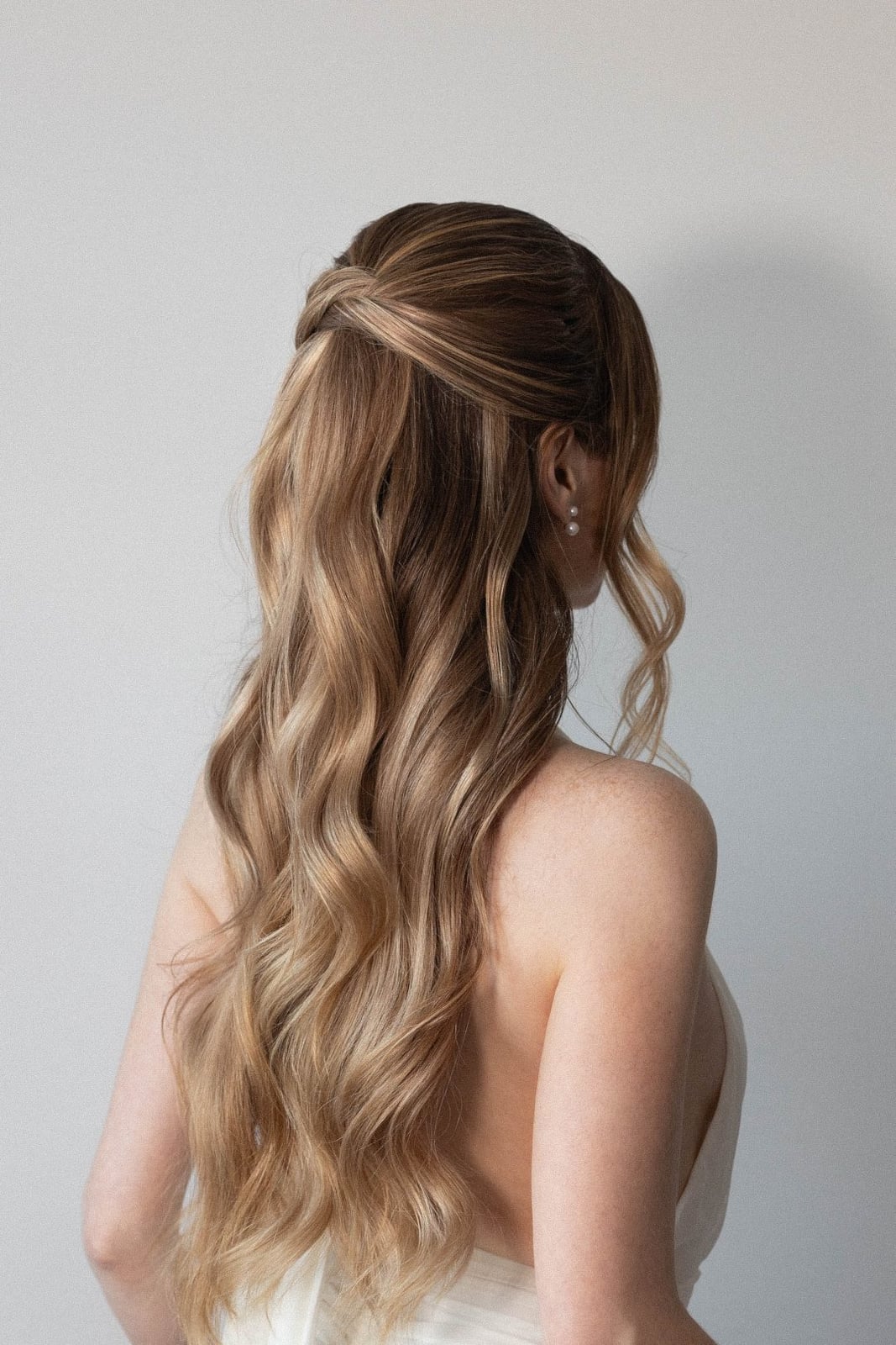 Blonde Wavy Twisted Updo With Pearl Pins Blonde Wavy Twisted Updo With Pearl Pins — Quick Quinceanera Hairstyles 2027