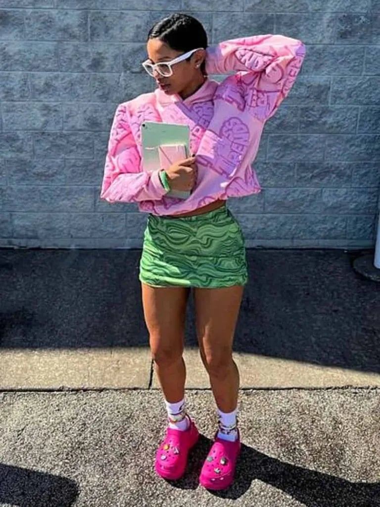 Graphic Hoodie and Mini Skirt Combination Graphic Hoodie and Mini Skirt Combination — Rap Concert Outfits 2027