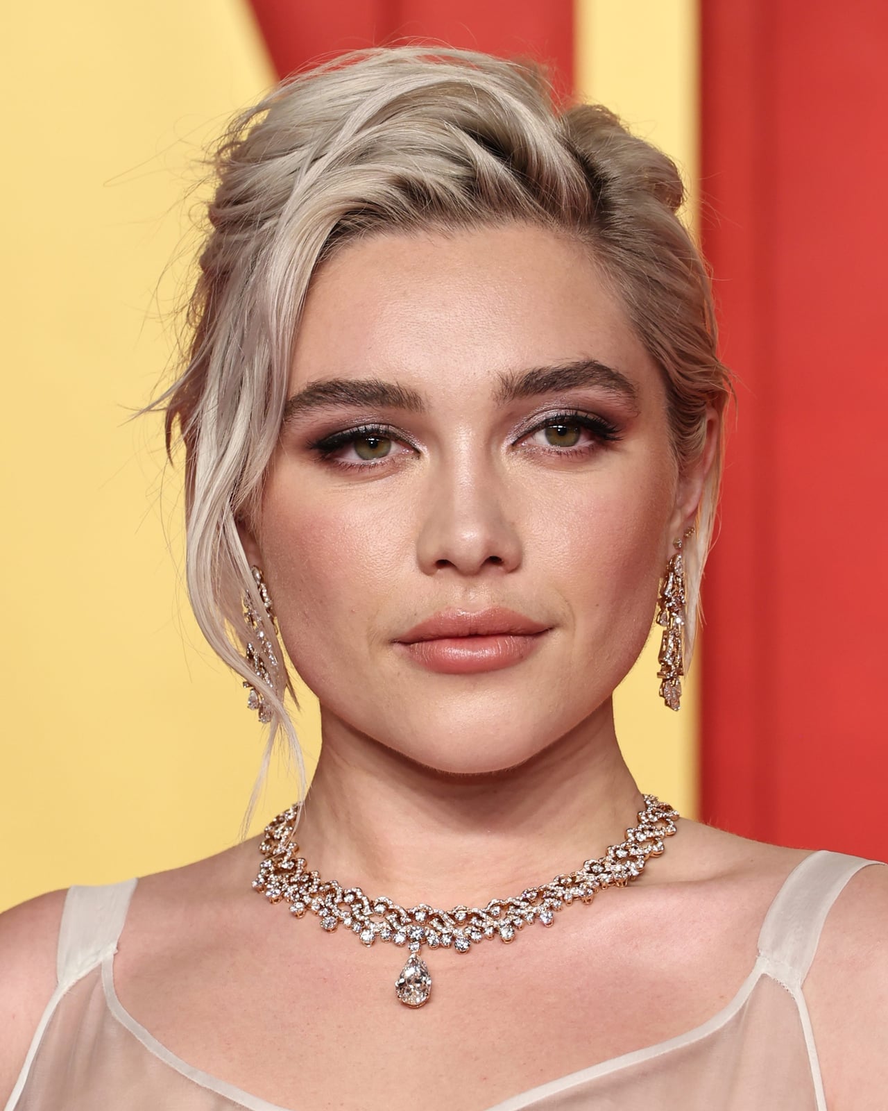 Messy Updo With Loose Tendrils Messy Updo With Loose Tendrils — Red Carpet Hairstyles 2027