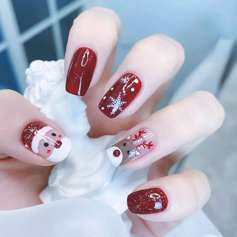 Short Oval Deep Red Reindeer Santa Nails Short Oval Deep Red Reindeer Santa Nails — Reindeer Nails 2026