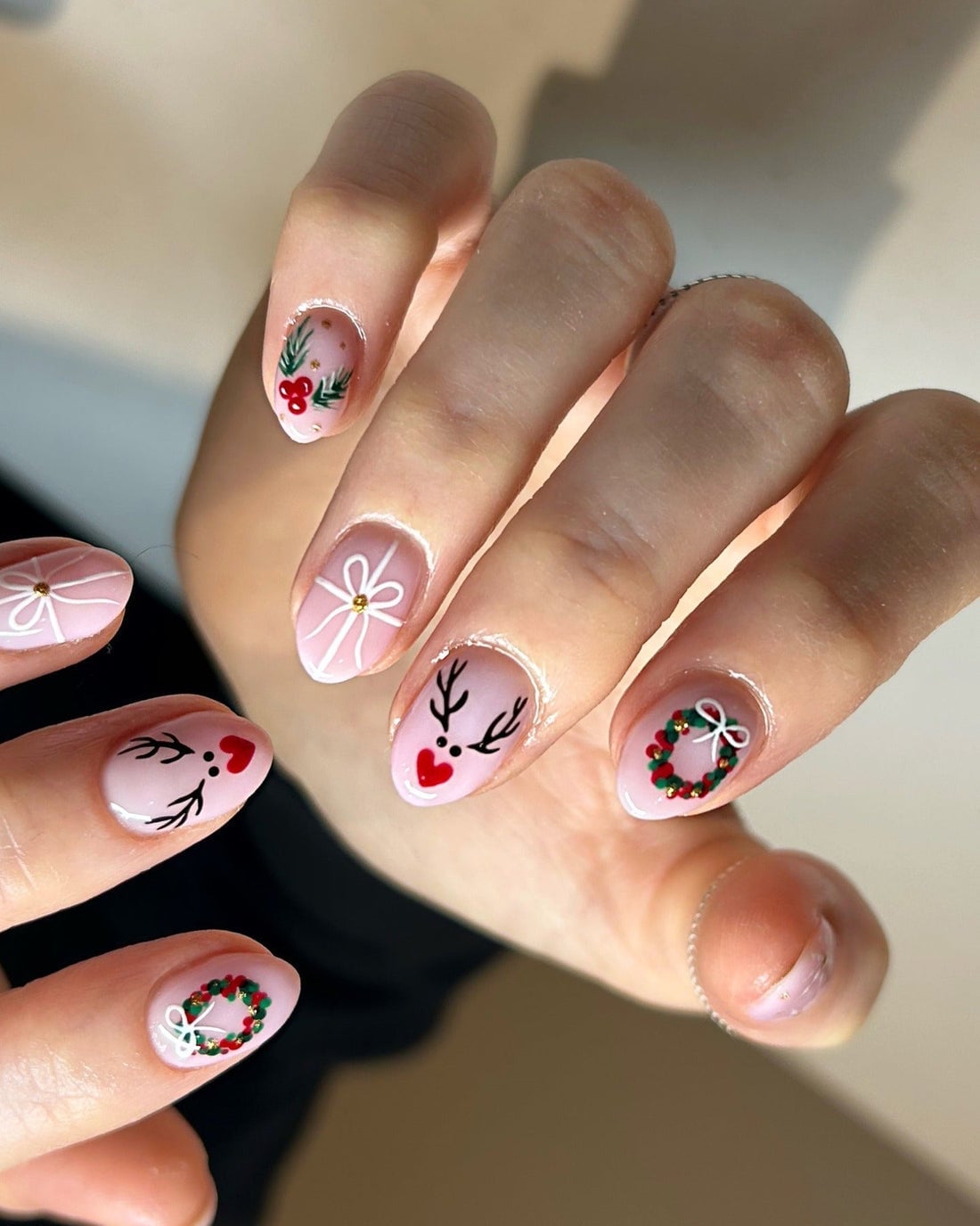 Short Oval Pink Reindeer French Tip Nails Short Oval Pink Reindeer French Tip Nails — Reindeer Nails 2026