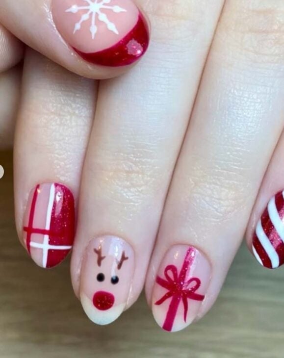 Short Oval Sheer Nude Reindeer Face Nails Short Oval Sheer Nude Reindeer Face Nails — Reindeer Nails 2026