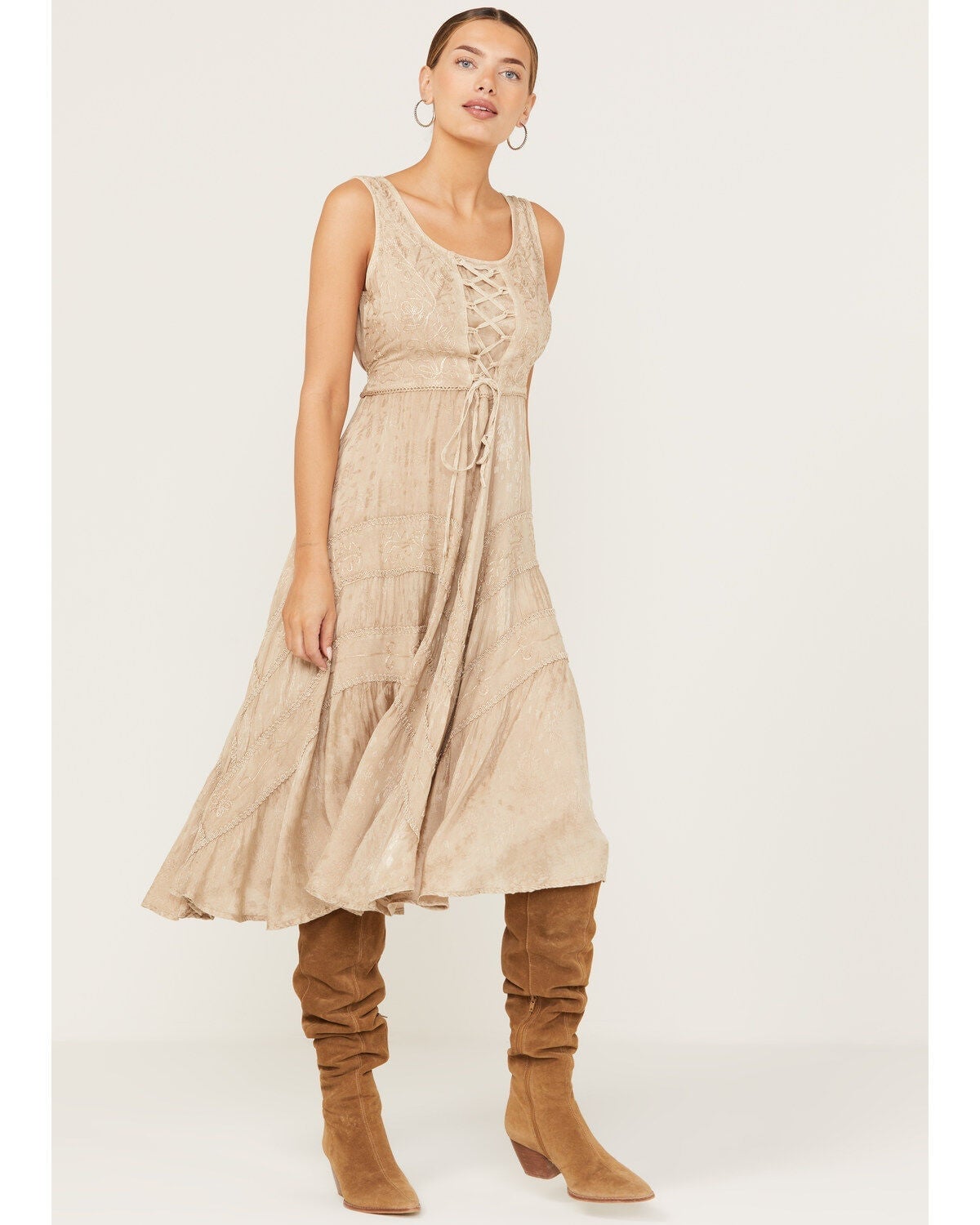 Beige lace-trimmed tiered midi dress with lace-up front Beige lace-trimmed tiered midi dress with lace-up front — Rustic Wedding Guest Dress 2027