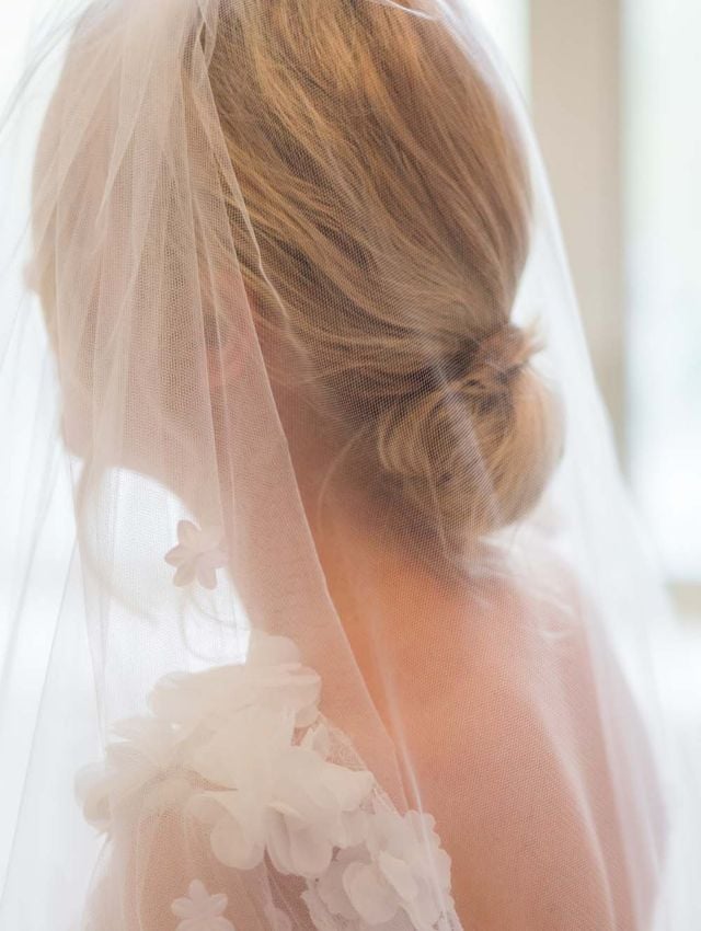 Back View Blonde Low Neat Bun With Veil Back View Blonde Low Neat Bun With Veil — Rustic Wedding Hairstyles 2027