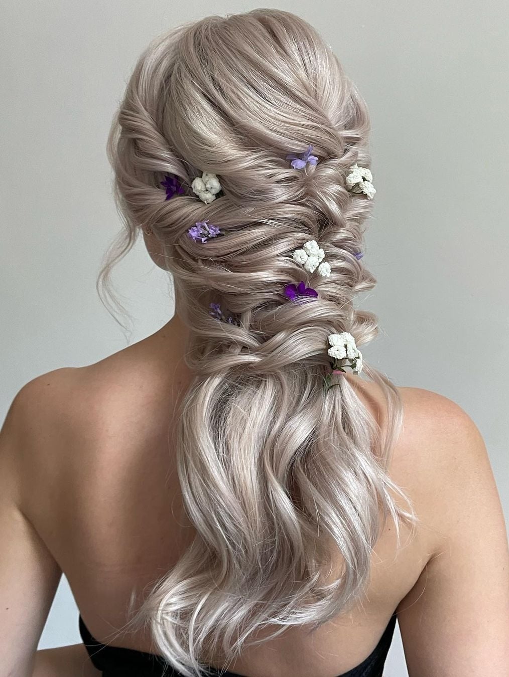 Long Ash Blonde Intricate Braided Updo With Flowers Long Ash Blonde Intricate Braided Updo With Flowers — Rustic Wedding Hairstyles 2027