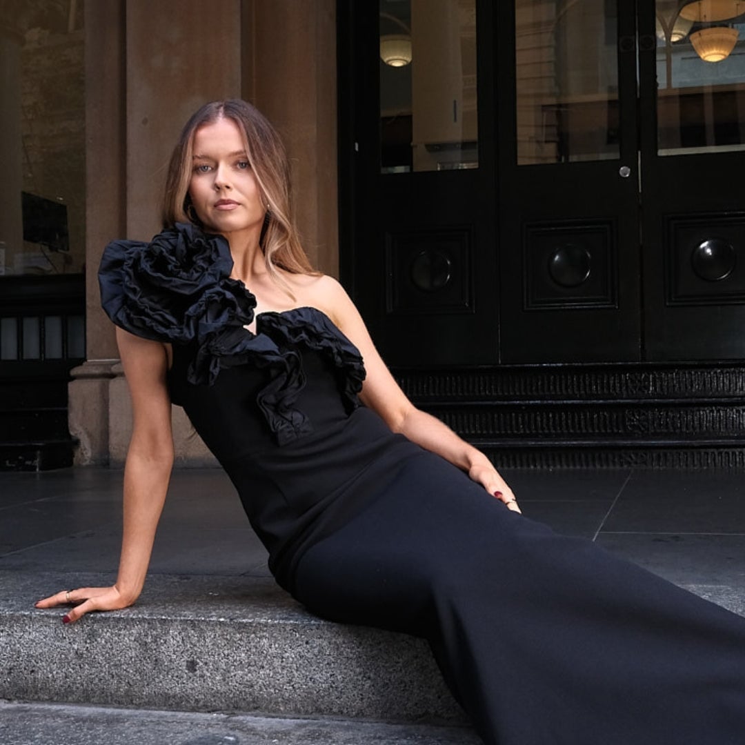Black one-shoulder column gown with ruffled shoulder Black one-shoulder column gown with ruffled shoulder — Semi Formal Dress 2027 for School Dance