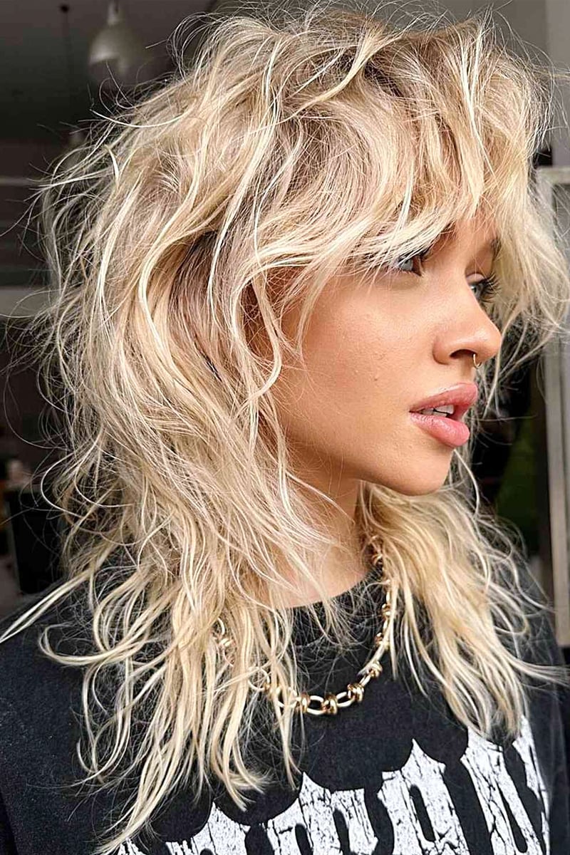 Platinum Blonde Mid-Back Shag Textured Layers — Shag 2027 with Curtain Bangs