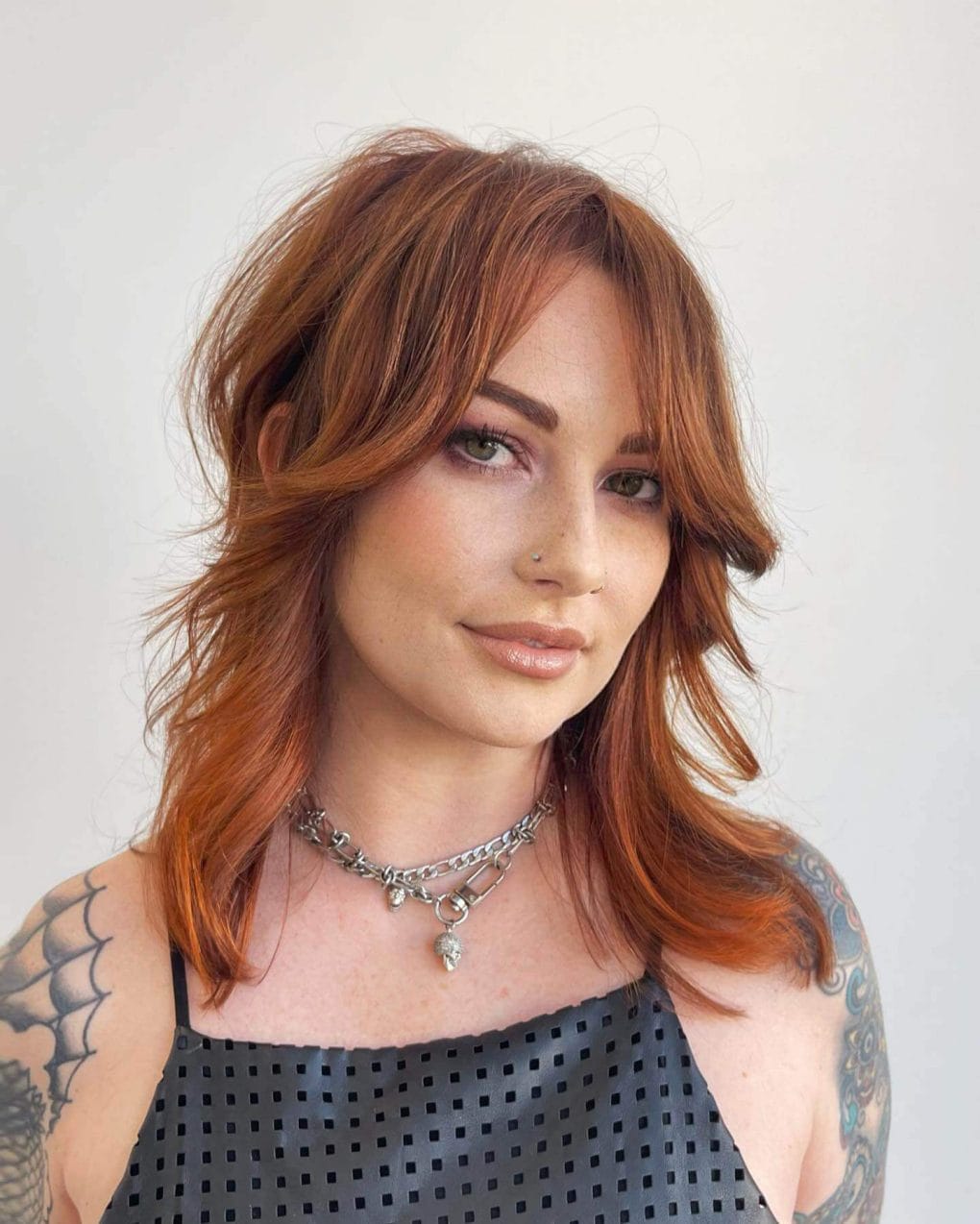 Copper Red Shag With Textured Layers — Shag 2027 with Curtain Bangs