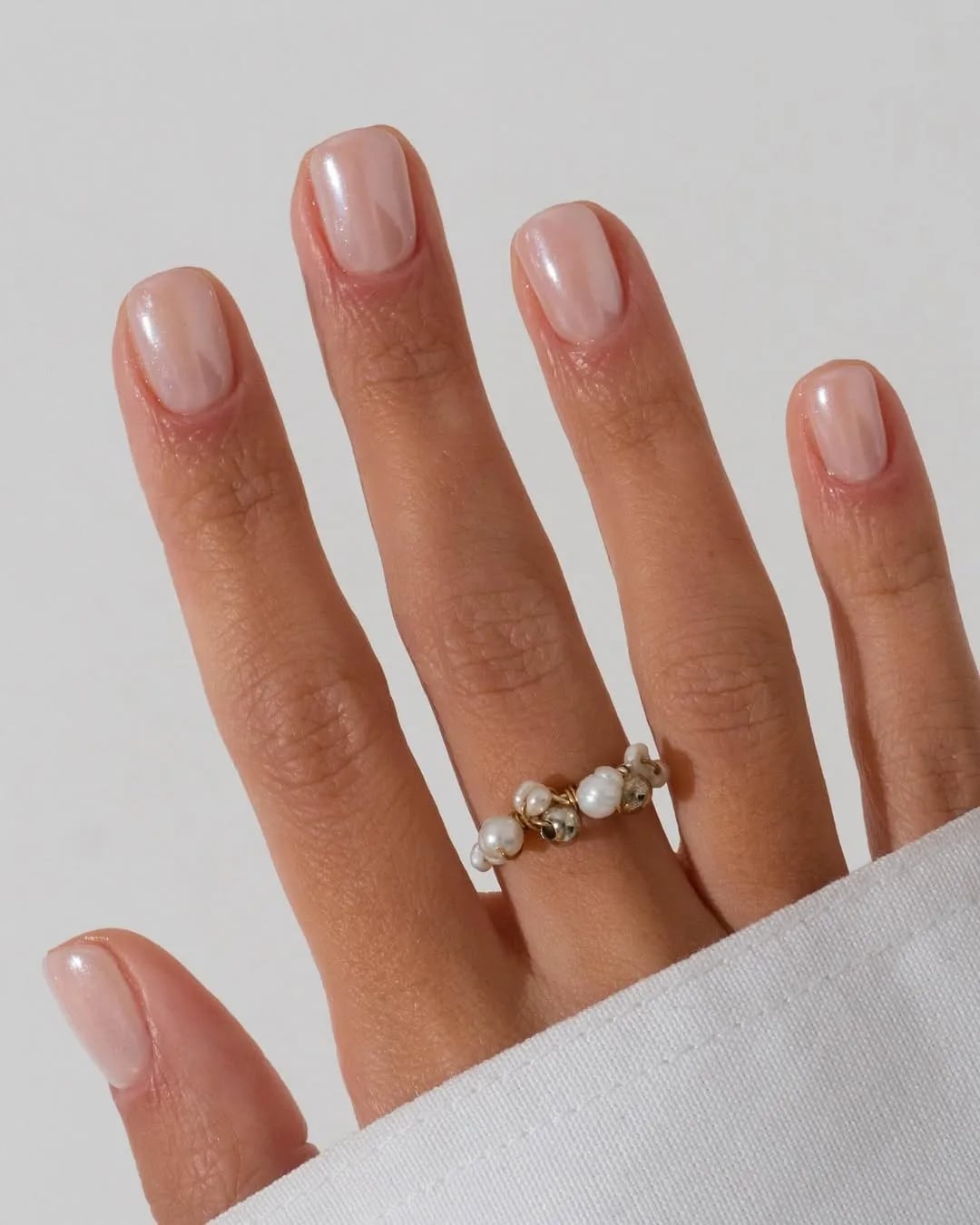 Sheer Milky Pink Glossy Short Square Sheer Milky Pink Glossy Short Square — Short Nails 2027 for Mature Hands