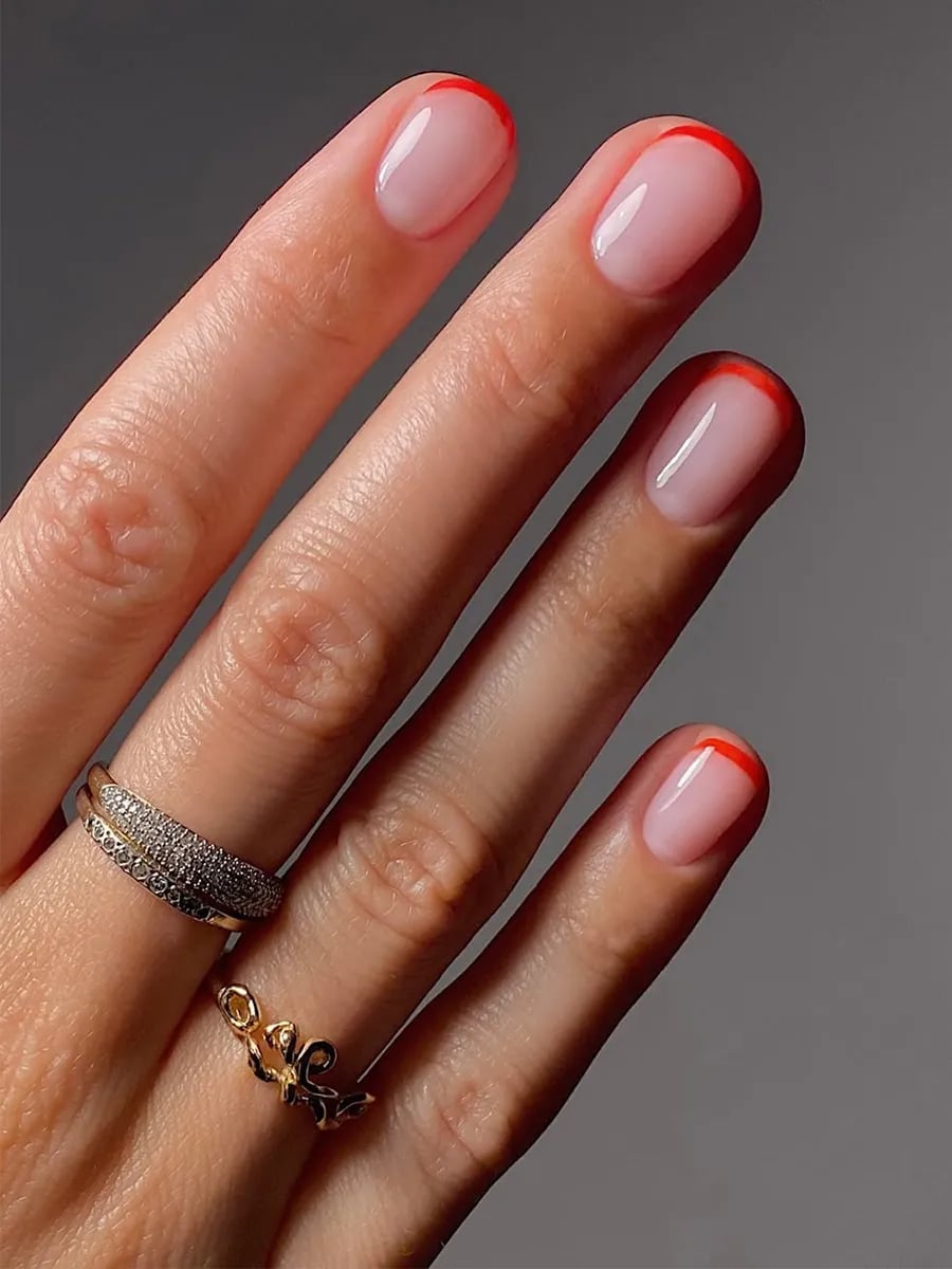 Nude With Thin Red Line French Tips Nude With Thin Red Line French Tips — Short Nails 2027 for Mature Hands