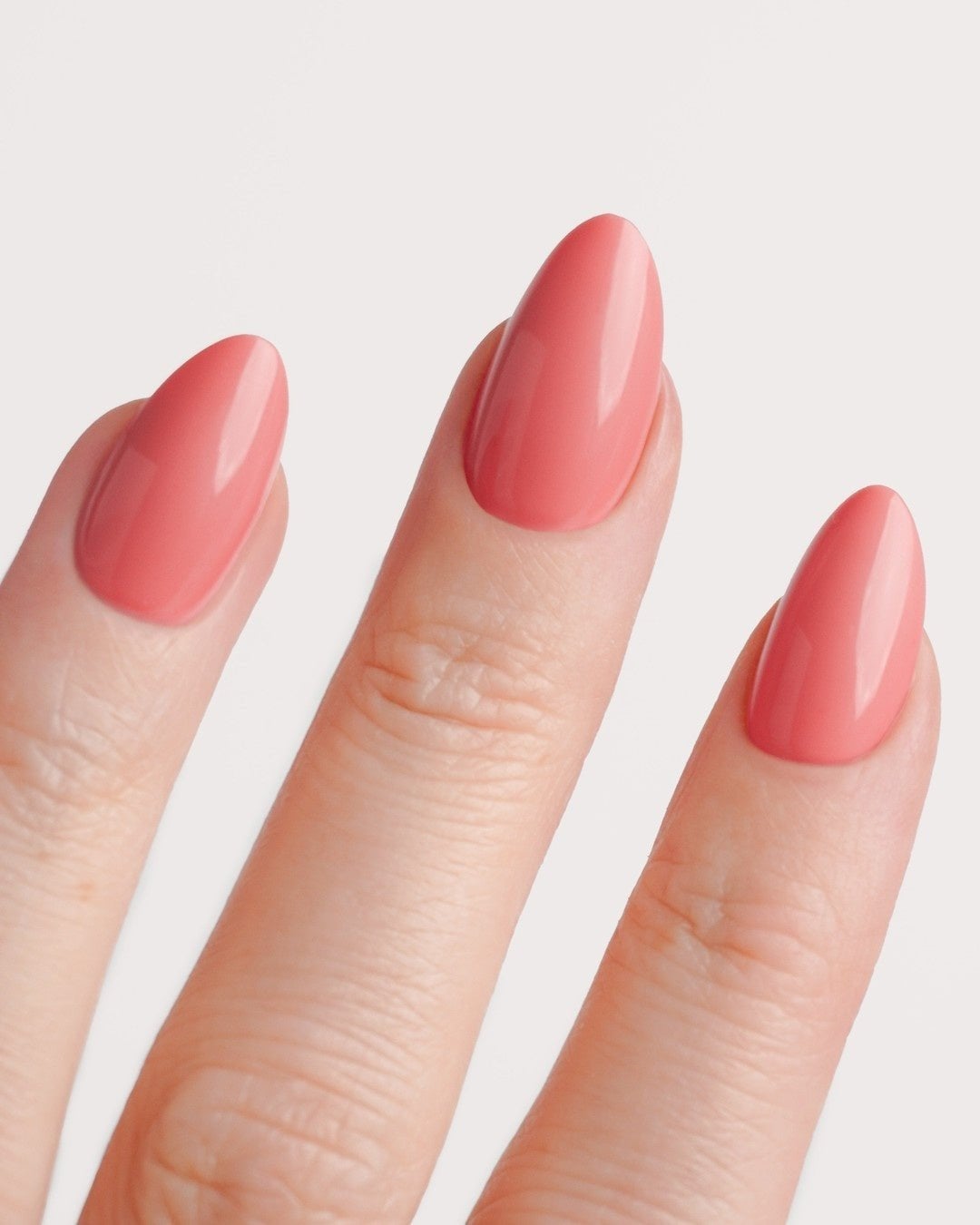 Uniform Medium Peach Glossy Short Almond Nails Uniform Medium Peach Glossy Short Almond Nails — Short Peach Nails 2027