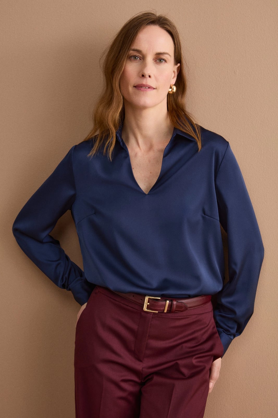 Navy blue silk V-neck blouse with burgundy trousers Navy blue silk V-neck blouse with burgundy trousers — Silk Blouse Outfits 2027