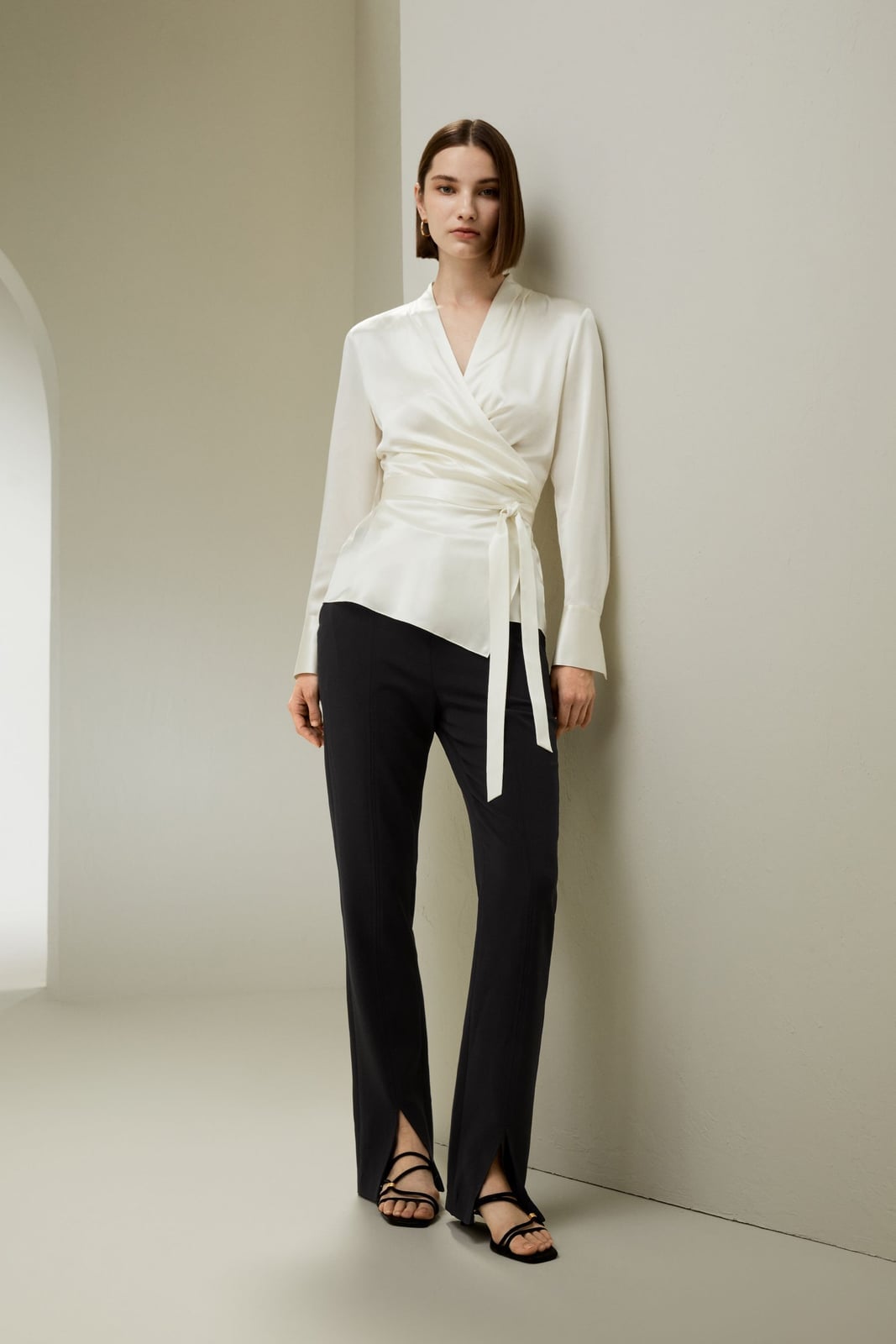 Ivory silk wrap blouse with black split-hem trousers, Close-Up Take Ivory silk wrap blouse with black split-hem trousers, Close-Up Take — Silk Blouse Outfits 2027