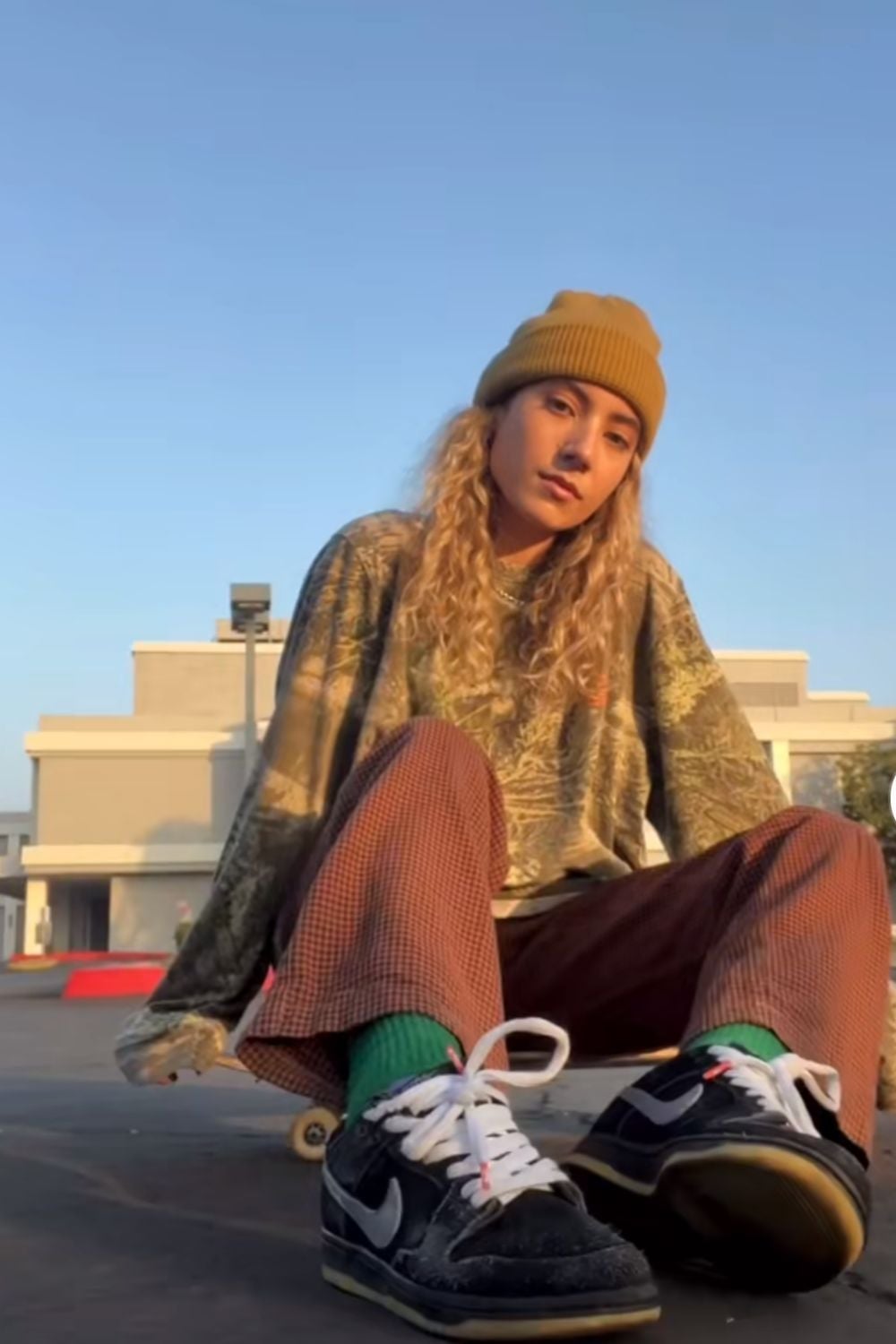 Graphic Sweatshirt With Camo Pants — Skate Outfits for Women 2027