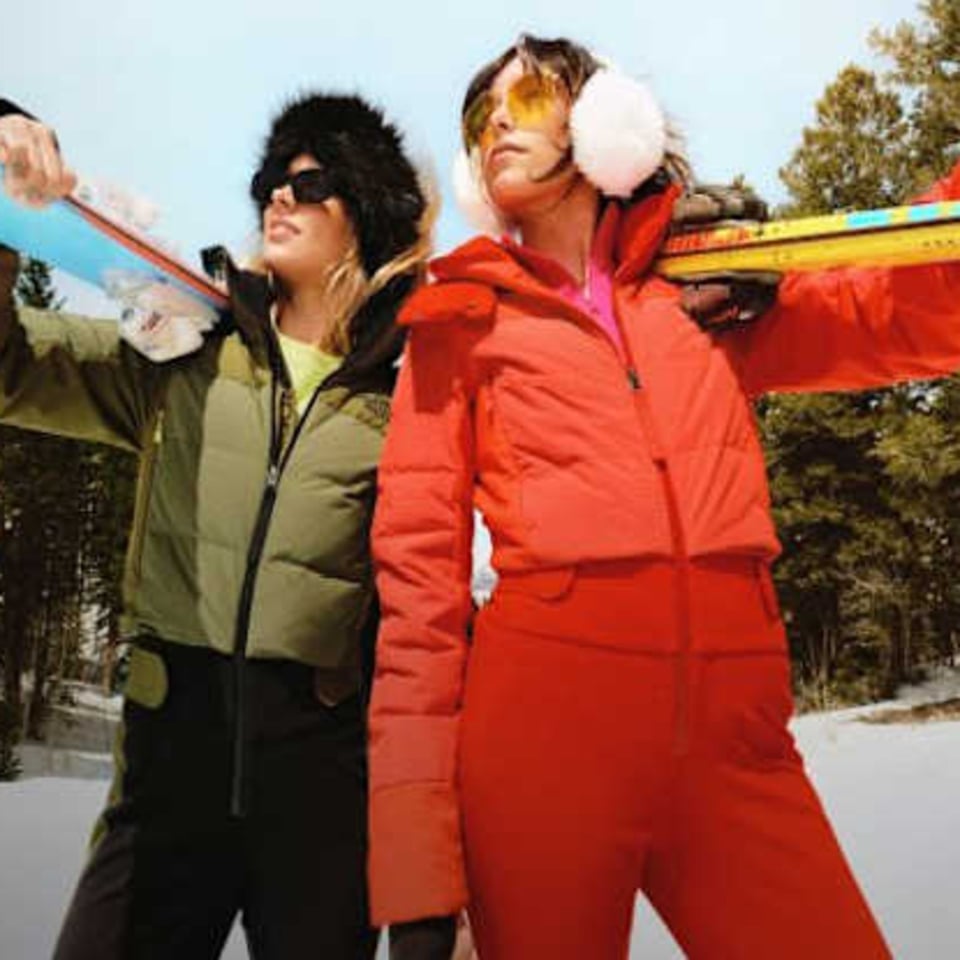 Red ski suit and olive green puffer vest Red ski suit and olive green puffer vest — Ski Trip Outfits 2027