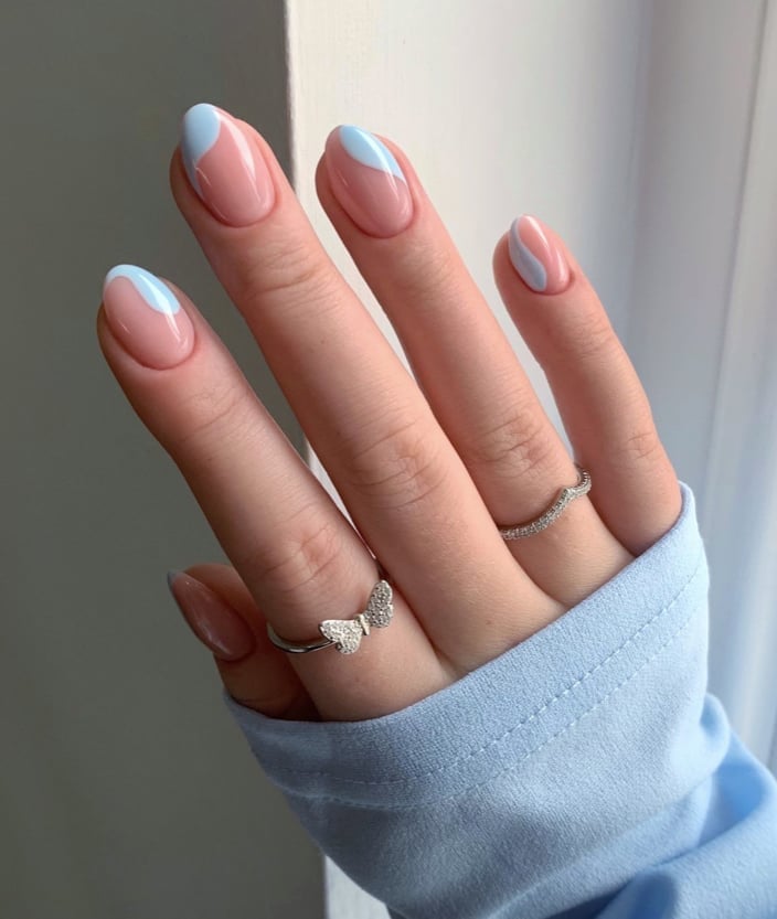 Sheer Nude With Sky Blue French Tips And Abstract Lines Sheer Nude With Sky Blue French Tips And Abstract Lines — Sky Blue Nails 2027