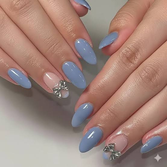 Glossy Sky Blue And Nude With Silver Bow Charms Glossy Sky Blue And Nude With Silver Bow Charms — Sky Blue Nails 2027