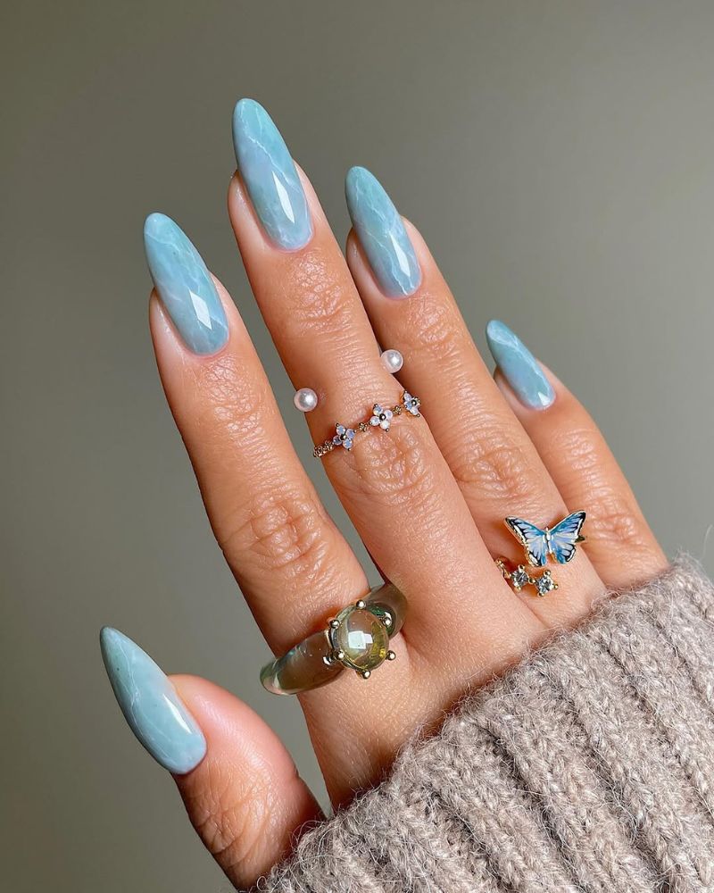 Marbled Ocean Wave Long Stiletto Nails, Office-Safe Version Marbled Ocean Wave Long Stiletto Nails, Office-Safe Version — Sky Blue Nails 2027