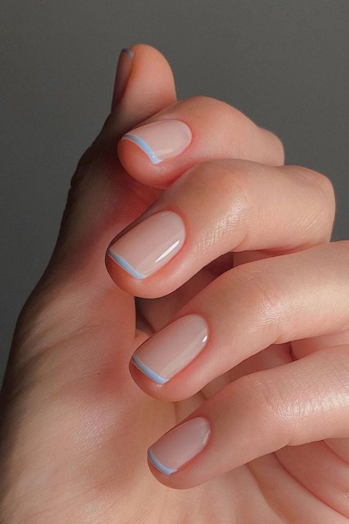 Sheer Nude With Thin Light Blue French Tip Sheer Nude With Thin Light Blue French Tip — Sky Blue Nails 2027