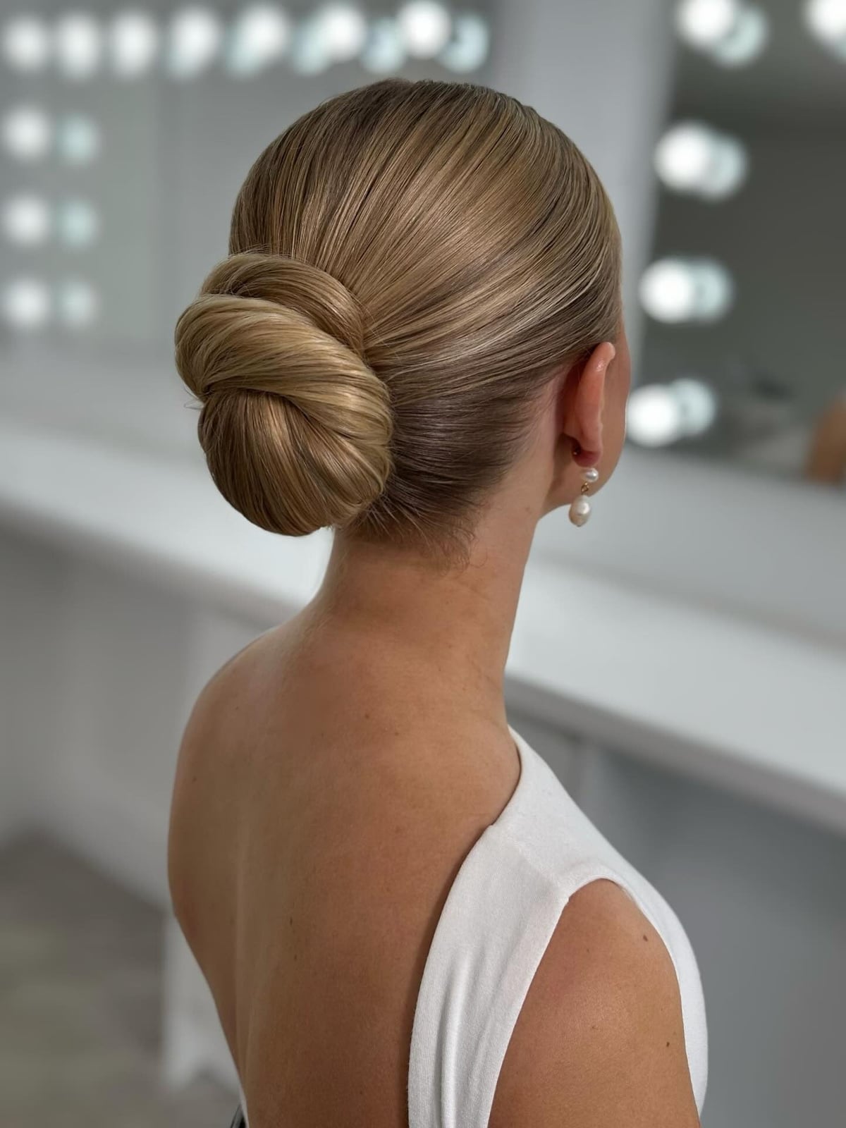 Honey Blonde Low Bun Intricate Honey Blonde Low Bun Intricate — Slick Back Hairstyles 2027