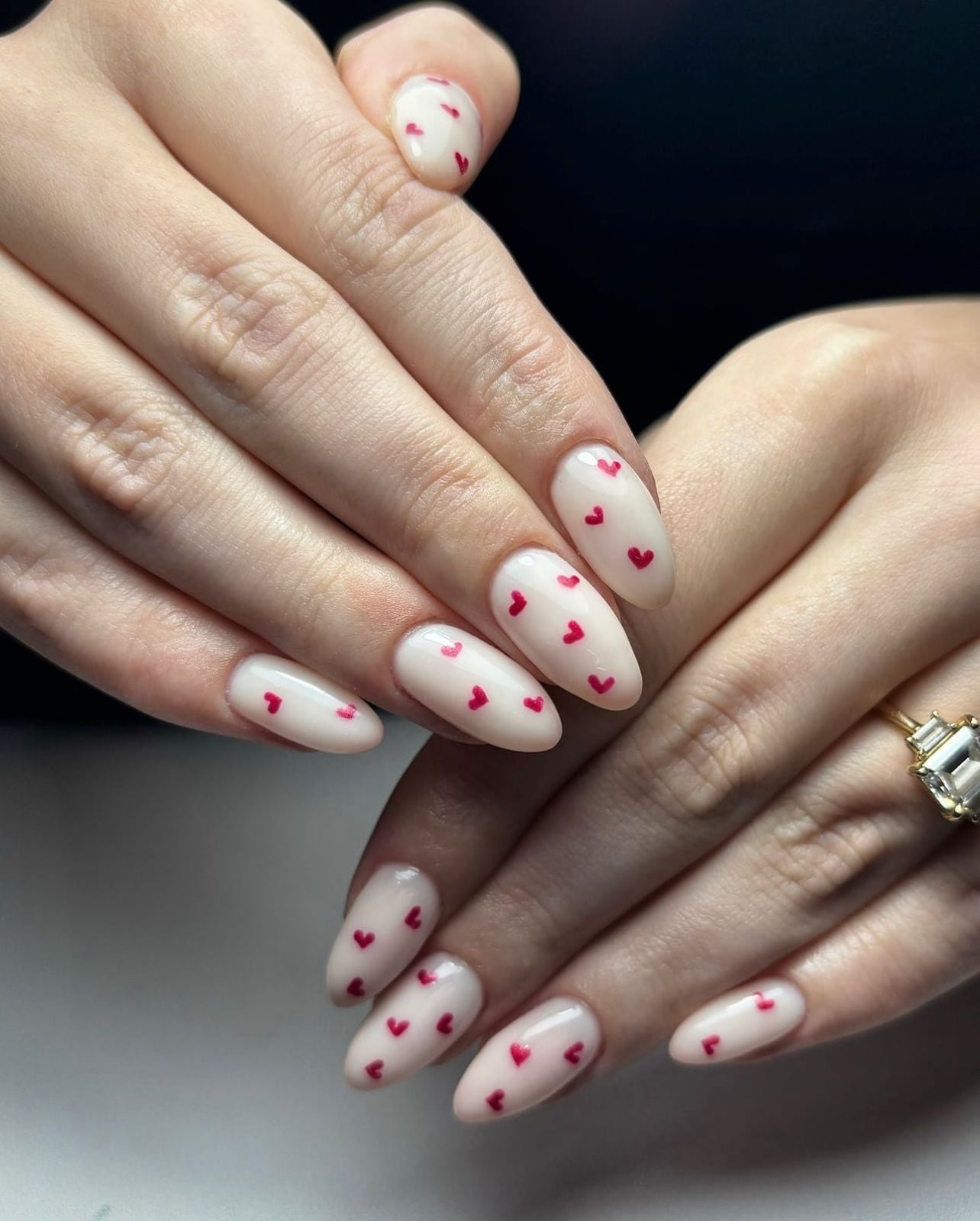 Medium Oval Sheer Nude With All-Over Red Hearts Medium Oval Sheer Nude With All-Over Red Hearts — Small Heart Nails 2027