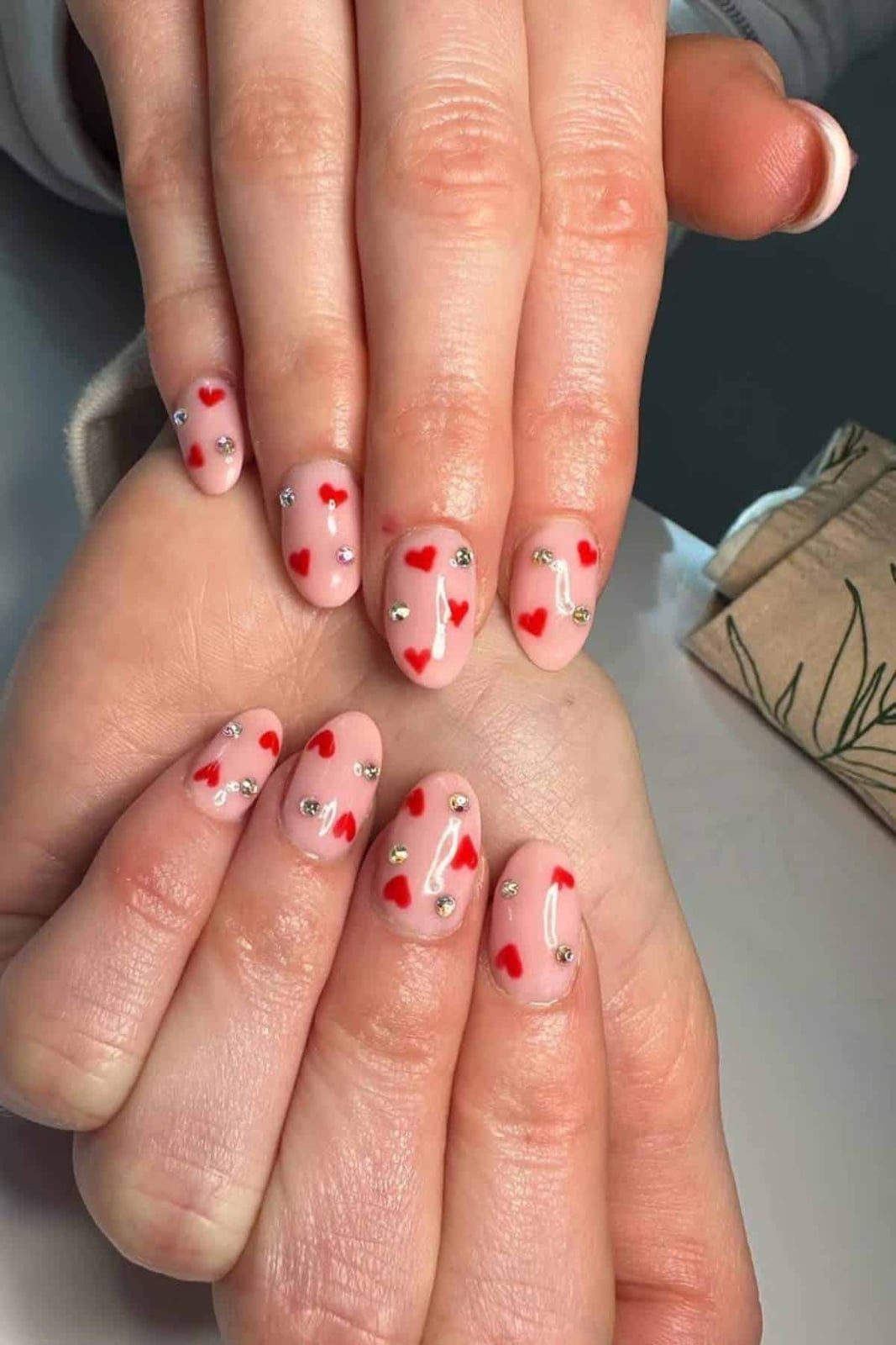 Short Oval Pale Pink With Scattered Hearts And Rhinestones Short Oval Pale Pink With Scattered Hearts And Rhinestones — Small Heart Nails 2027