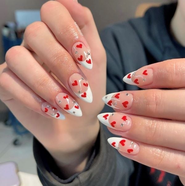 Long Stiletto Sheer With Red Hearts And Rhinestones Long Stiletto Sheer With Red Hearts And Rhinestones — Small Heart Nails 2027