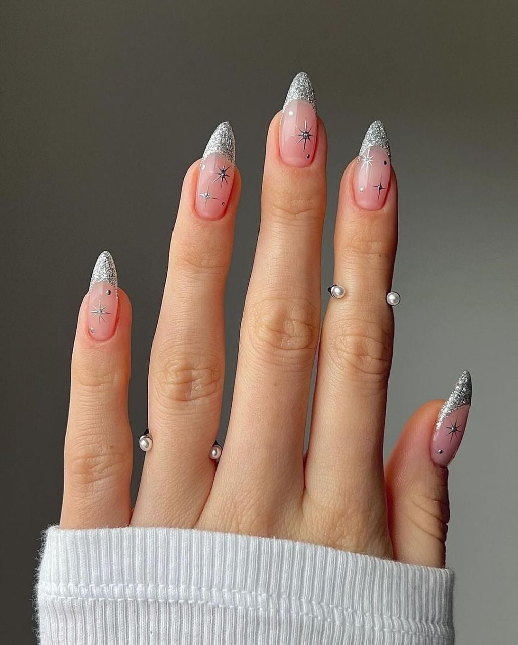 Long Almond Silver Glitter Star Art Long Almond Silver Glitter Star Art — Sparkly New Years Nails 2027