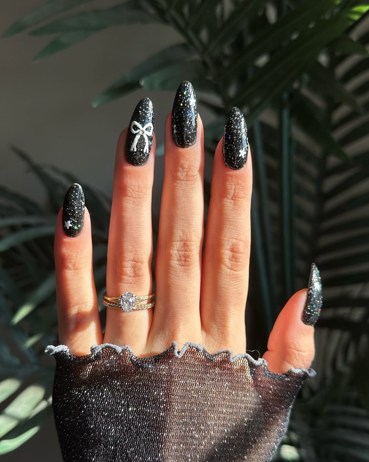 Medium-Long Black Silver Glitter Bow Star Nails Medium-Long Black Silver Glitter Bow Star Nails — Sparkly New Years Nails 2027