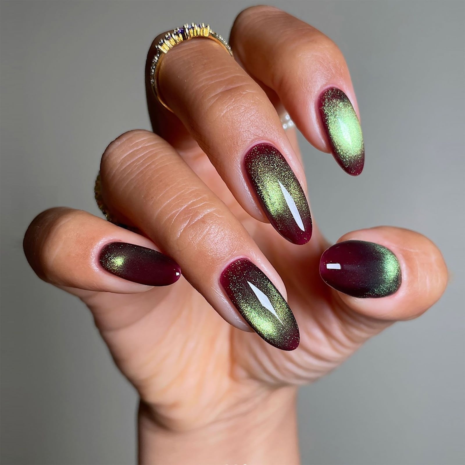 Medium Almond Green-Gold Cat-Eye Nails Medium Almond Green-Gold Cat-Eye Nails — Sparkly New Years Nails 2027