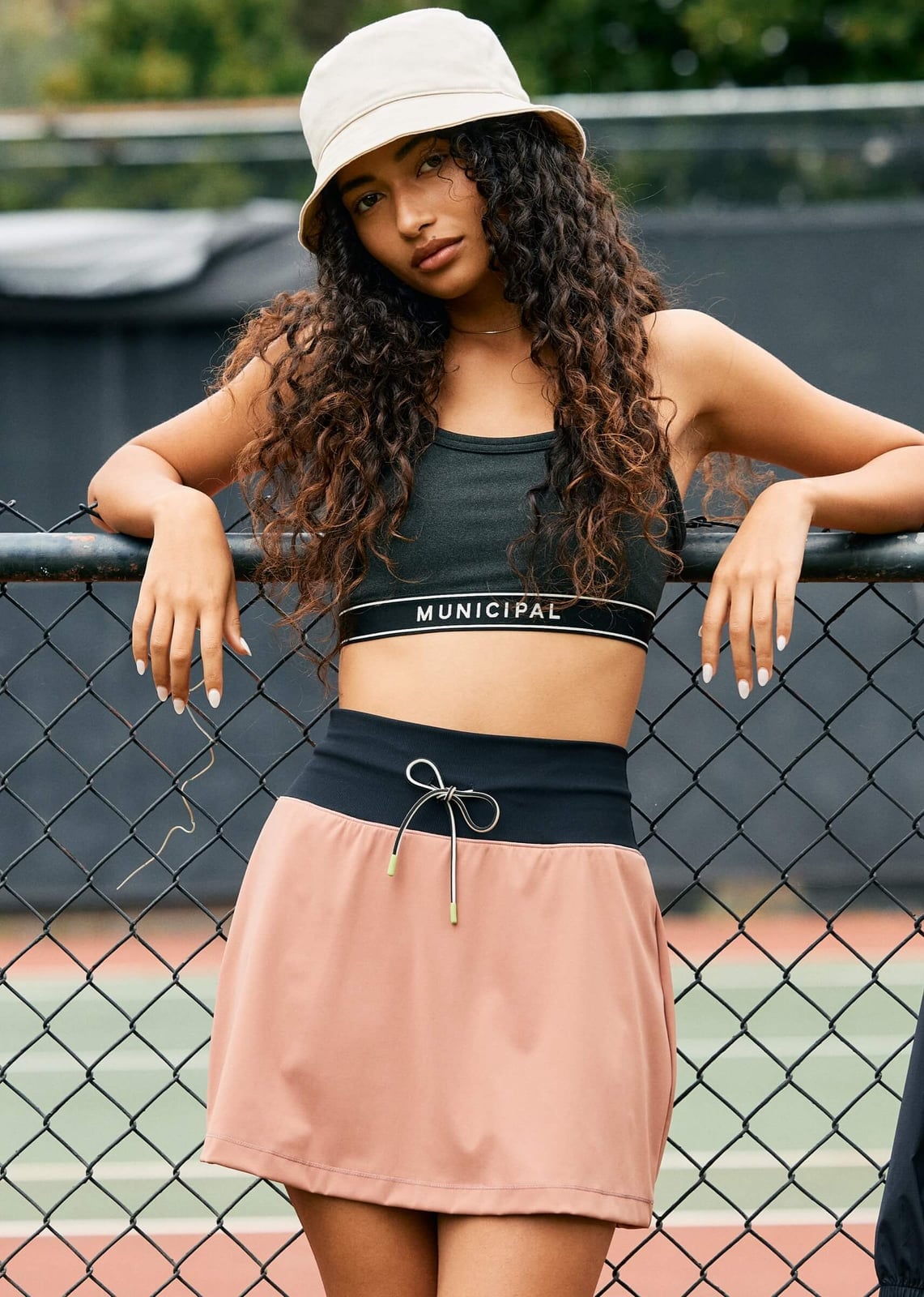 Pink drawstring skirt with gray sports bra Pink drawstring skirt with gray sports bra — Sporty Athletic Outfits 2027