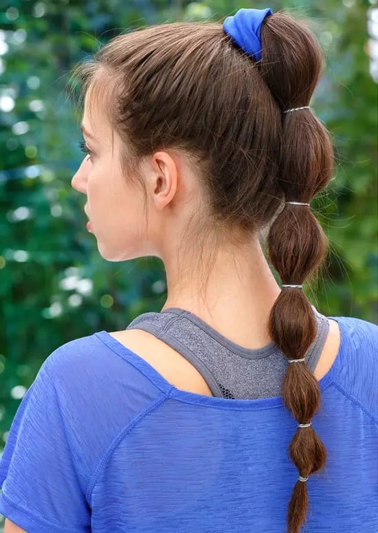 High Bubble Ponytail With Segments High Bubble Ponytail With Segments — Sporty Gym Hairstyles 2027
