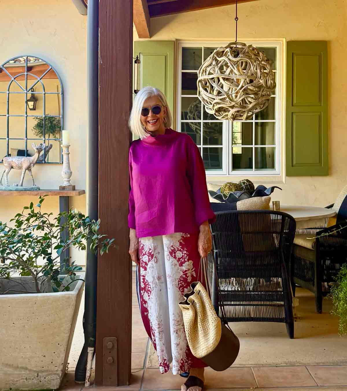 Fuchsia tunic top over patterned wide-leg trousers Fuchsia tunic top over patterned wide-leg trousers — Spring Break Night Outfits 2027