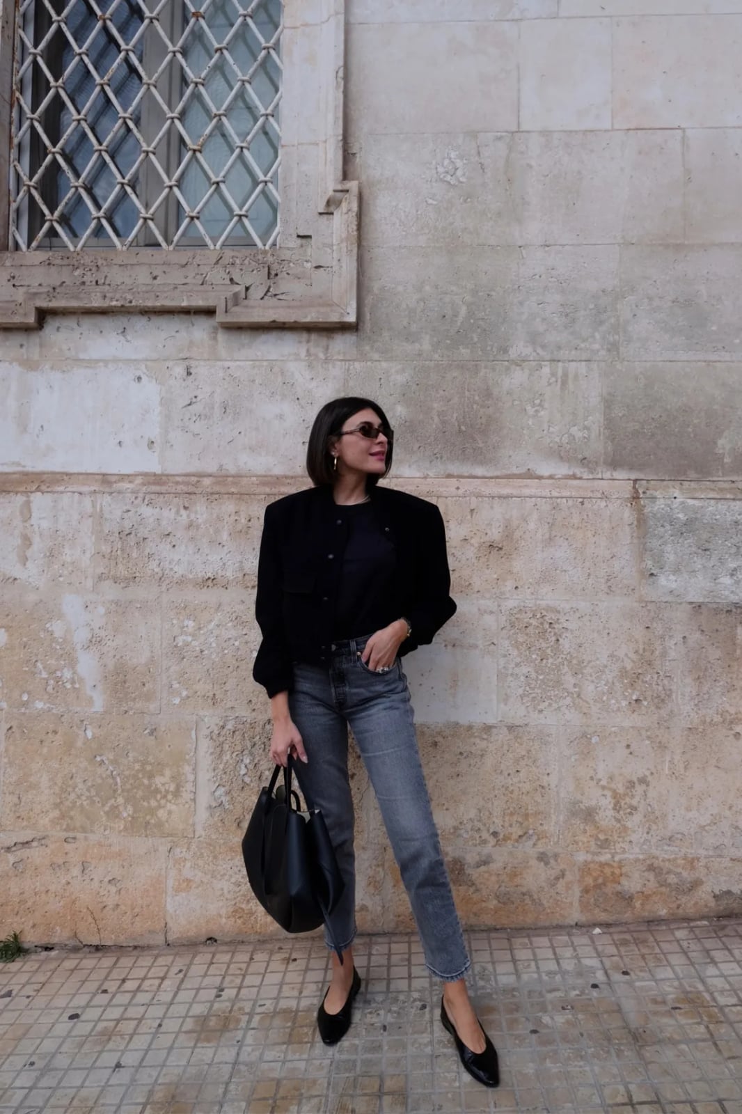 Black pointed-toe flats with gray jeans and bomber jacket Black pointed-toe flats with gray jeans and bomber jacket — Spring Outfits 2027 with Ballet Flats