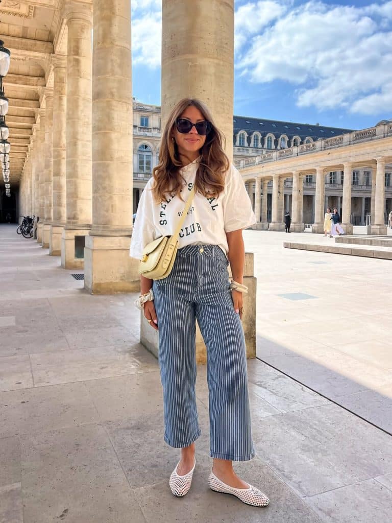 White perforated flats with striped wide-leg pants White perforated flats with striped wide-leg pants — Spring Outfits 2027 with Ballet Flats
