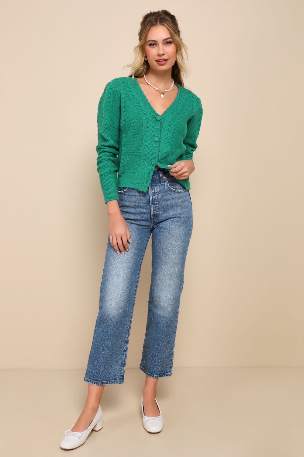 Green cable-knit cardigan with white top and straight-leg jeans Green cable-knit cardigan with white top and straight-leg jeans — St Patricks Day Outfits 2027