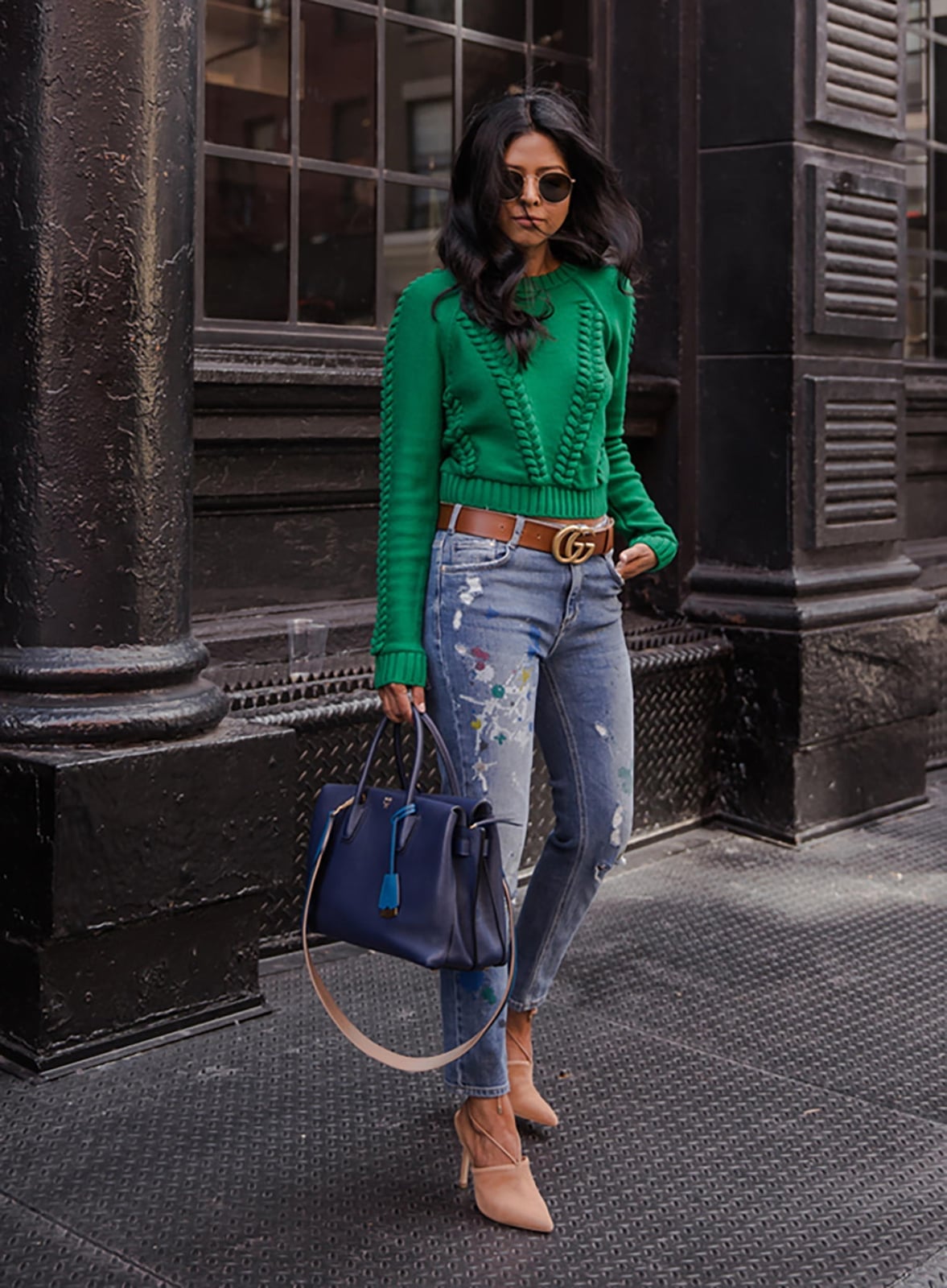 Green cable knit sweater with distressed jeans and logo belt Green cable knit sweater with distressed jeans and logo belt — St Patricks Day Outfits 2027