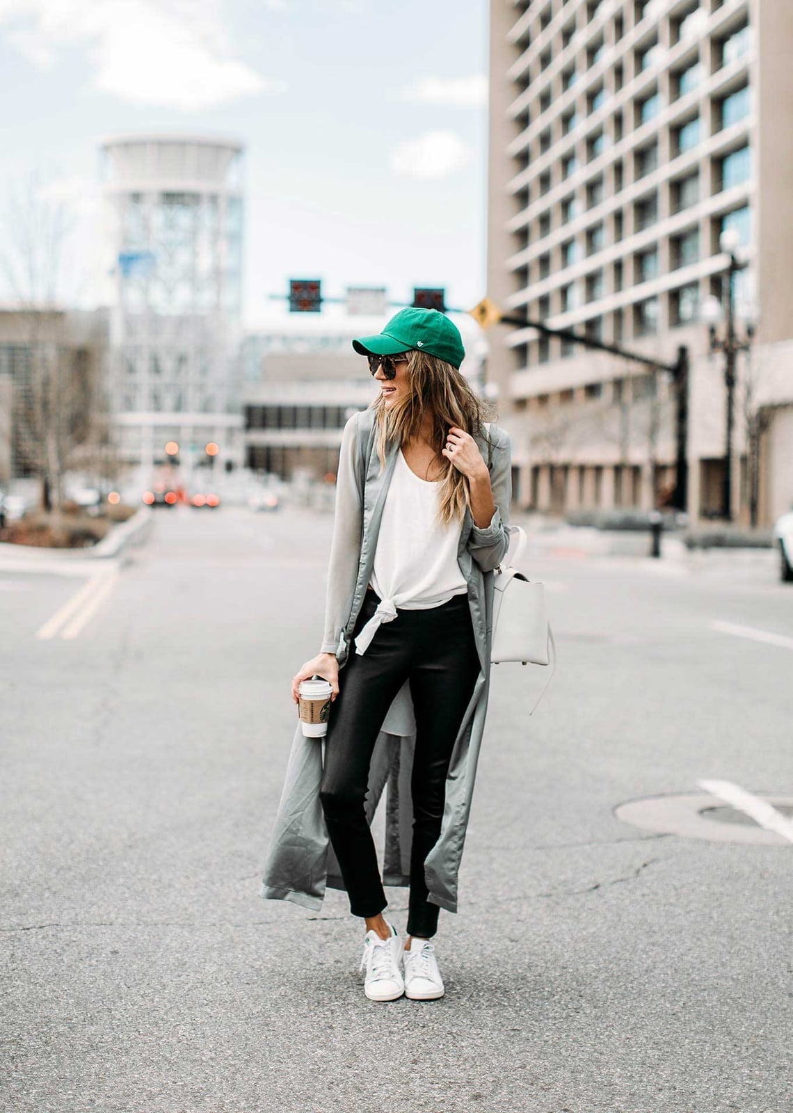 Gray duster coat with green baseball cap and white sneakers Gray duster coat with green baseball cap and white sneakers — St Patricks Day Outfits 2027