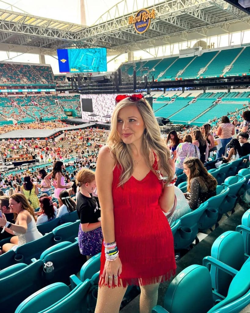 Denim Jacket Over Black Strapless Dress Denim Jacket Over Black Strapless Dress — Stadium Concert Outfits 2027