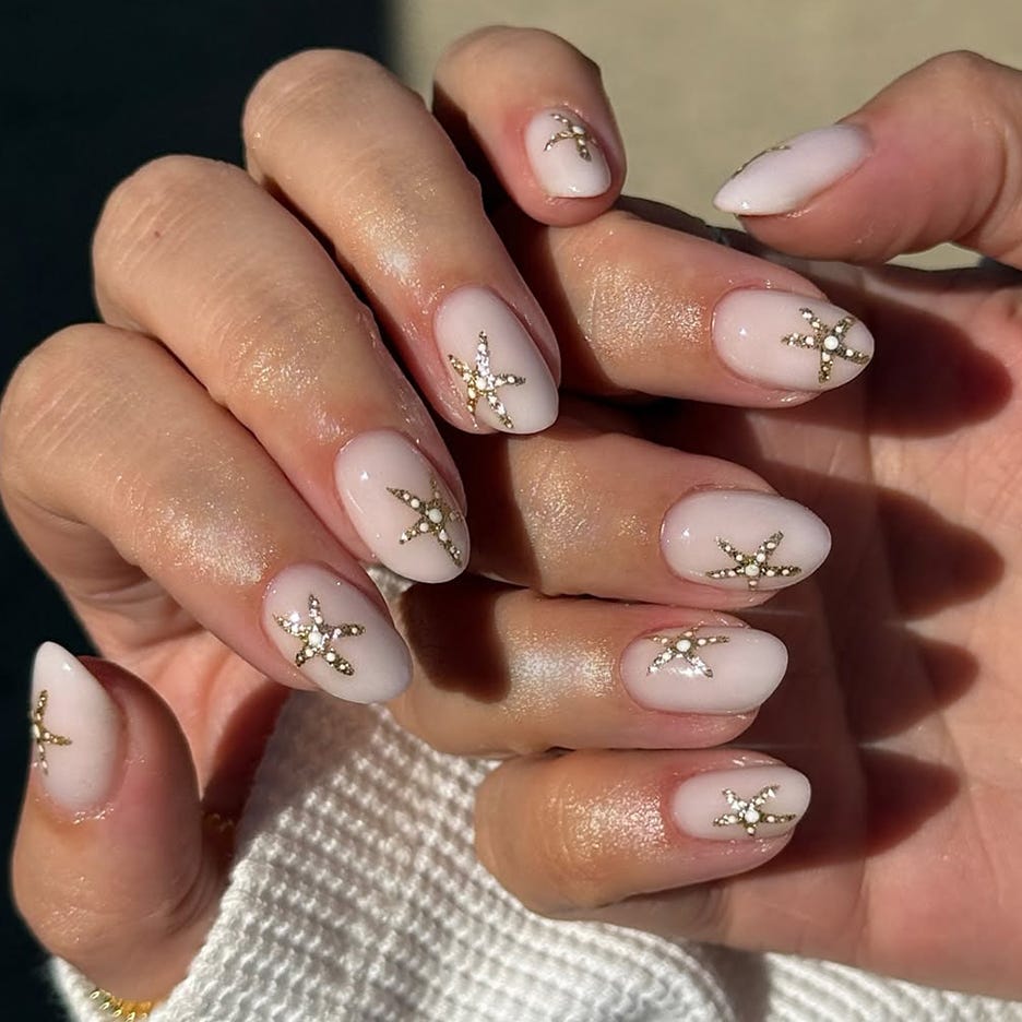 Nude Oval Nails With Gold Starfish Charms Nude Oval Nails With Gold Starfish Charms — Summer Wedding Nails 2027