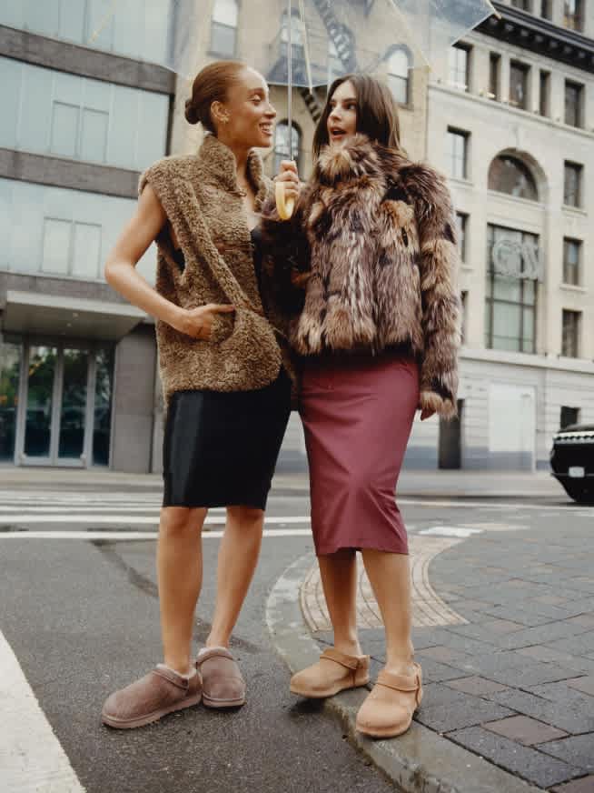 Faux fur vest and brown slip-on clogs, She Holds A Clear Umbrella Faux fur vest and brown slip-on clogs, She Holds A Clear Umbrella — Tasman Uggs Outfits 2027