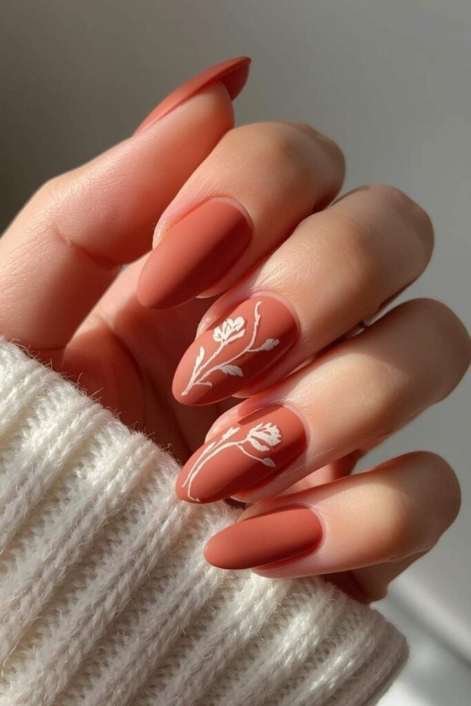 Matte Terracotta With White Floral Art Matte Terracotta With White Floral Art — Terracotta Nails 2027